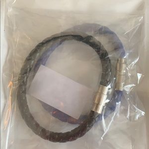 2 black leather bracelets